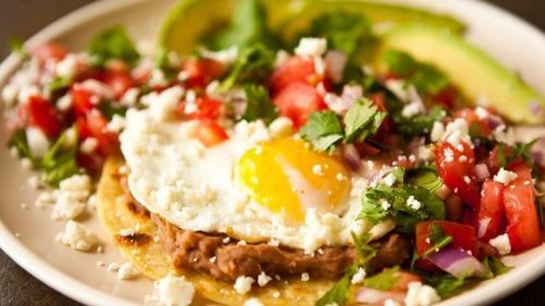 Beef Huevos Rancheros on Canadian Bacon